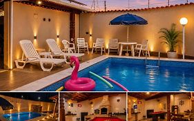 Casa Linda e Espacosa com Lareira e 2 Piscinas - Adulto e Infantil, sendo Adulto Aquecida - Proximo da Praia